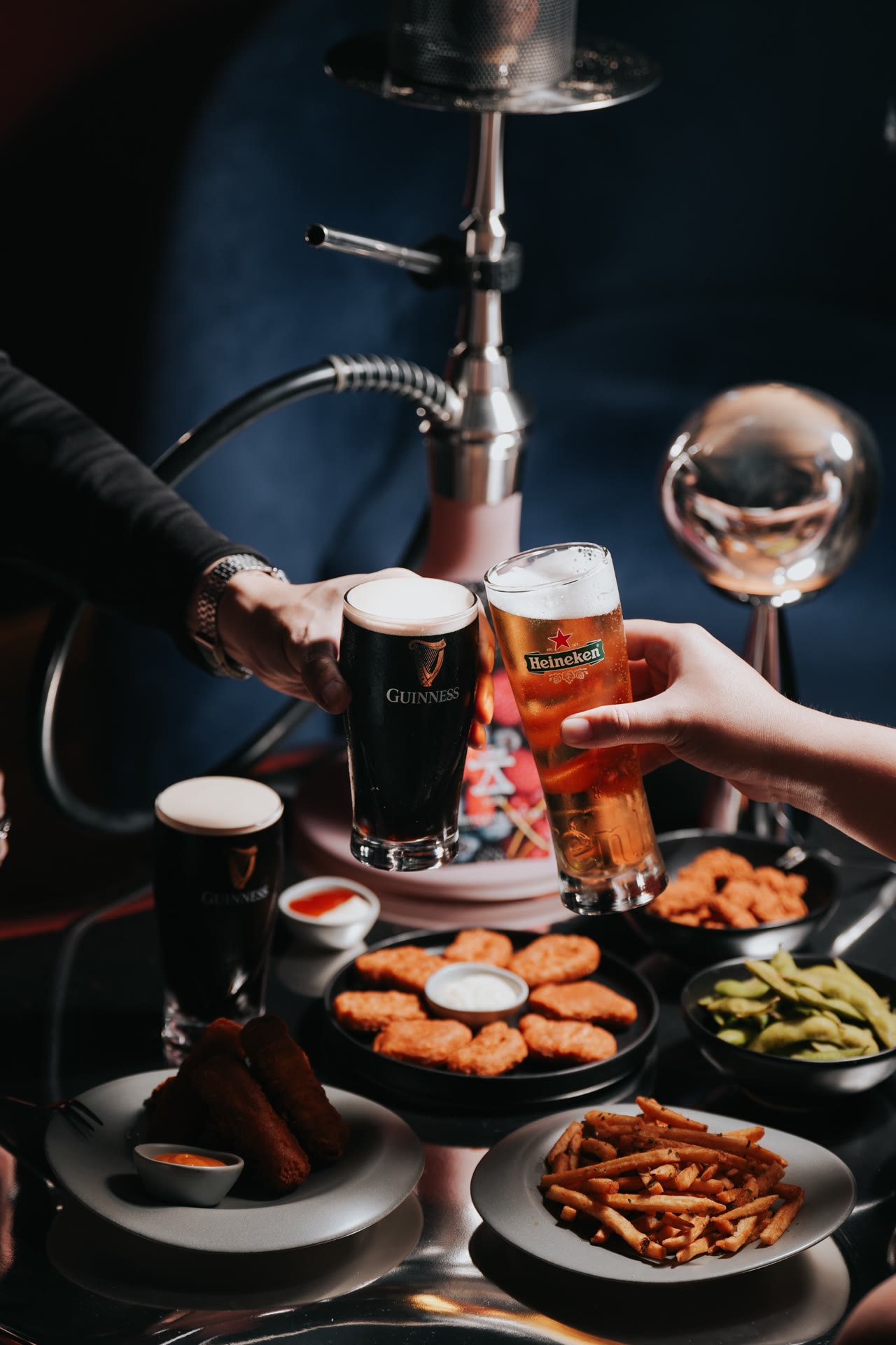 Guinness and Heineken with shisha and small plates