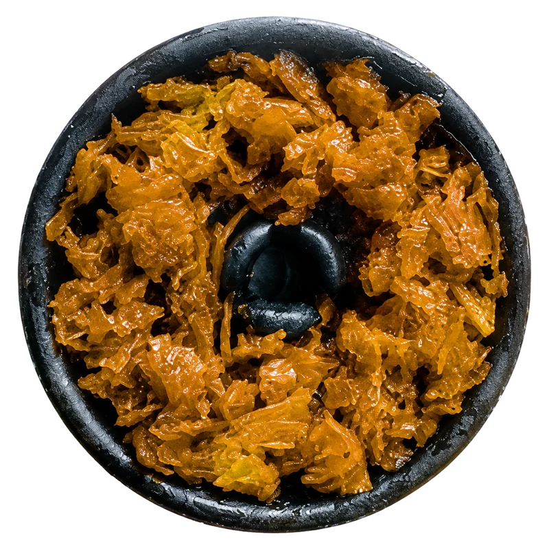 Blonde leaf tobacco in a clay bowl